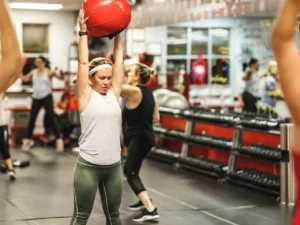 Fitness class using medicine ball