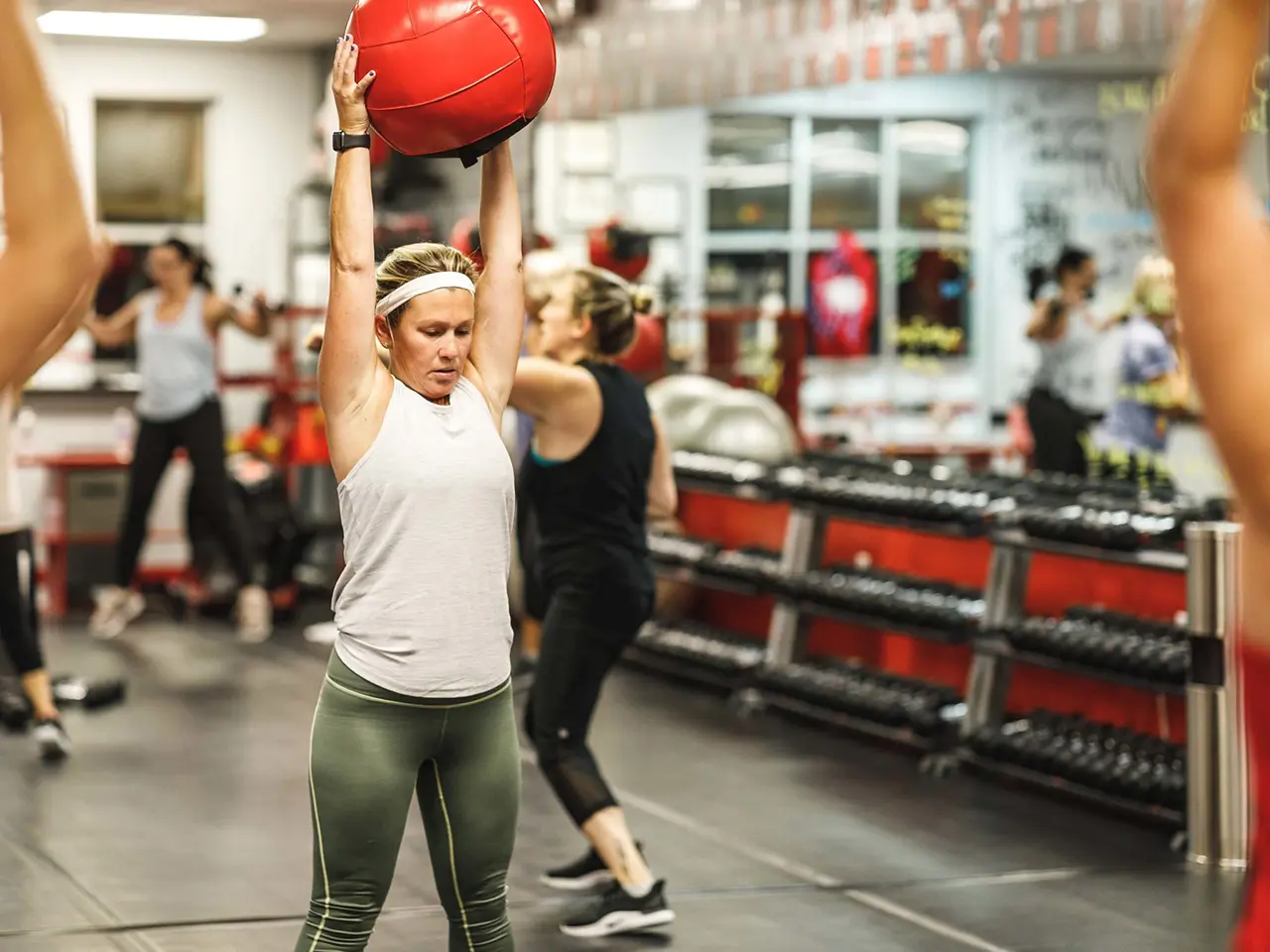 Fitness class using medicine ball